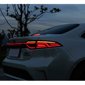 For 2020-2024 Toyota US Corolla LED Tail Lights with Sequential Breathing Turn Signal Replace OEM Dynamic Rear Lamps (Smoked/Red) - TT-ABC